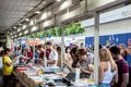 Les extérieurs font la promotion d'un pavillon ibero-américain à la foire du livre pour le sommet de Madrid en 2026